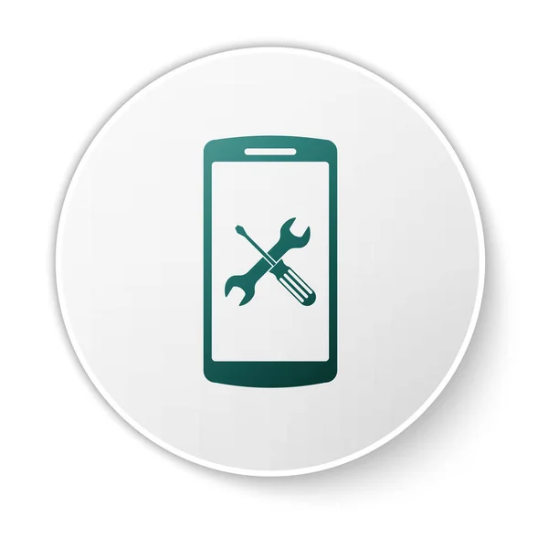 Smartphone verde con destornillador e icono de llave inglesa aislado sobre fondo blanco. Ajuste, servicio, ajuste, mantenimiento, reparación, fijación. Botón círculo blanco. Ilustración vectorial — Vector de stock