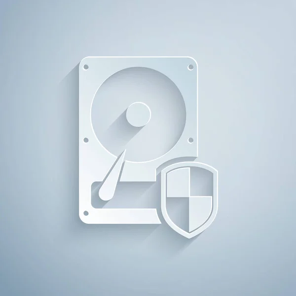Corte de papel Disco duro Icono de protección HDD aislado sobre fondo gris. Estilo de arte de papel. Ilustración vectorial — Vector de stock