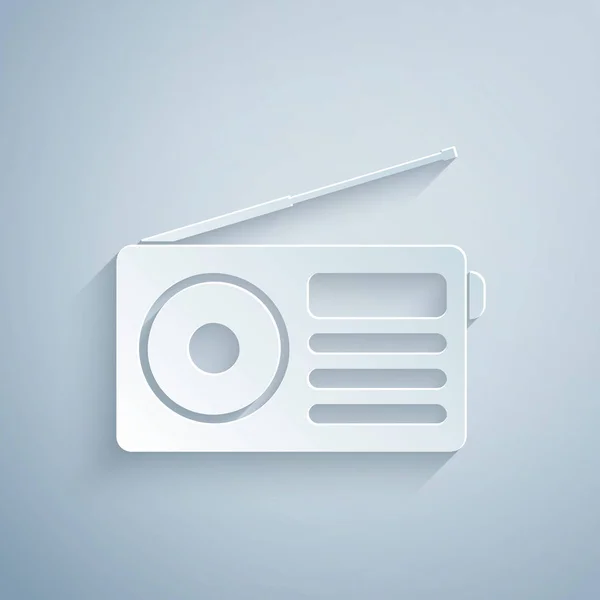 Paper cut Radio with antenna icon isolated on grey background. Paper art style. Vector Illustration — Stock Vector