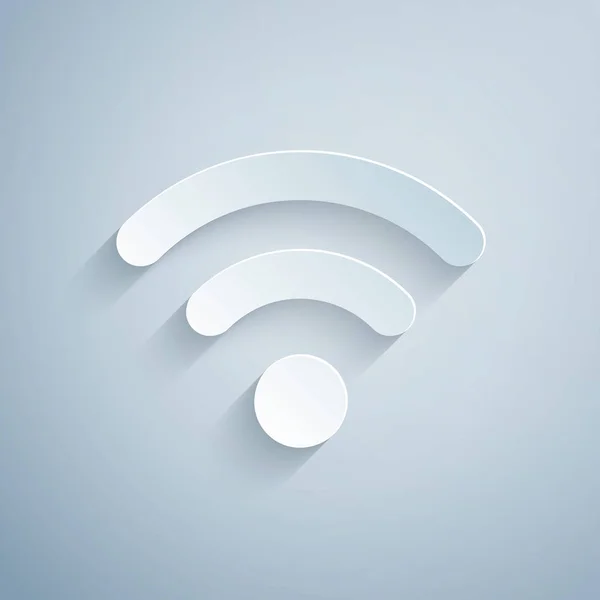 Папір вирізав значок бездротової мережі Інтернету Wi-Fi ізольовано на сірому фоні. Стиль паперового мистецтва. Векторна ілюстрація — стоковий вектор