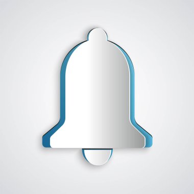 Kağıt kesiği Gri arkaplanda izole edilmiş zil simgesi. Alarm sembolü, servis zili, el zili işareti, uyarı sembolü. Kağıt sanatı tarzı. Vektör İllüstrasyonu