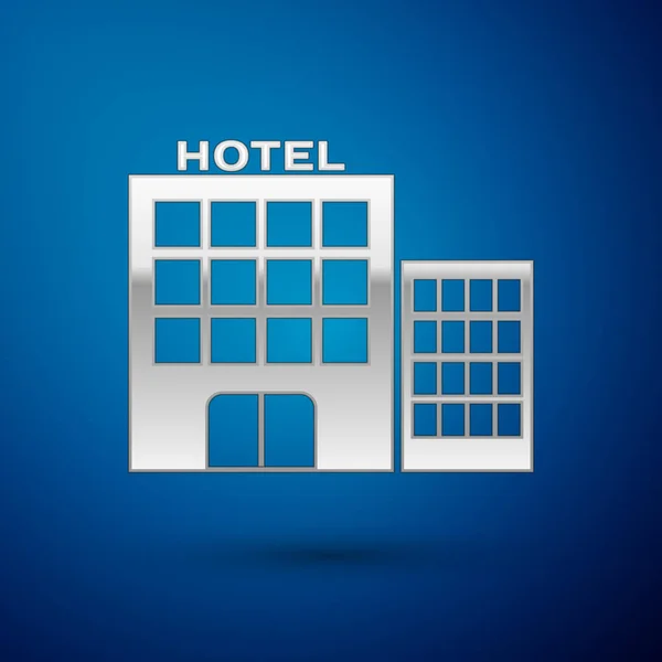 Silbernes Hotelbau-Symbol isoliert auf blauem Hintergrund. Vektorillustration — Stockvektor