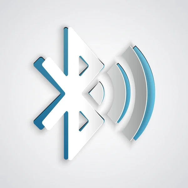 Papper klippa Bluetooth ansluten ikonen isolerad på grå bakgrund. Papperskonst stil. Vektor illustration — Stock vektor