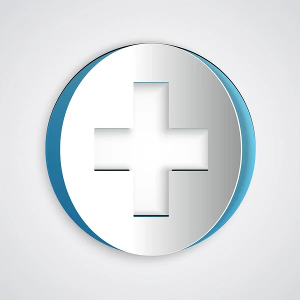 Paper cut Medical cross in circle icon isolated on grey background. First aid medical symbol. Paper art style. Vector Illustration — Stock Vector