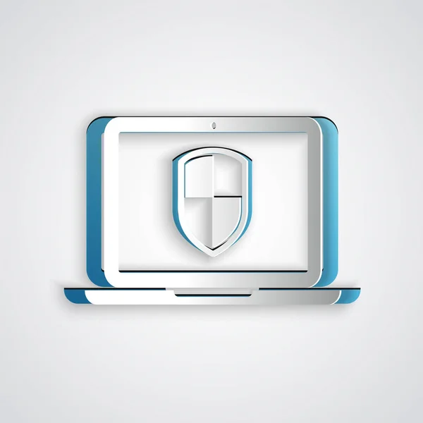 Papiergeschnittener Laptop geschützt mit Schild-Symbol isoliert auf grauem Hintergrund. Internetsicherheit. PC-Sicherheit, Firewall-Technologie, Datenschutz. Papierkunst. Vektorillustration — Stockvektor