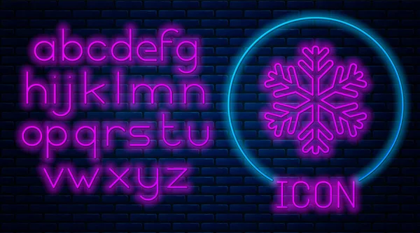 Glowing neonSnowflake icon isolated on brick wall background. Neon light alphabet. Vector Illustration — Stock Vector