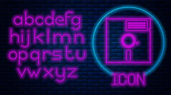Glowing neon Floppy disk in the 5.25-inch icon isolated on brick wall background. Floppy disk for computer data storage. Diskette sign. Neon light alphabet. Vector Illustration — Stock Vector