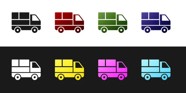 Set camion consegna con scatole di cartone dietro l'icona isolato su sfondo bianco e nero. Illustrazione vettoriale — Vettoriale Stock