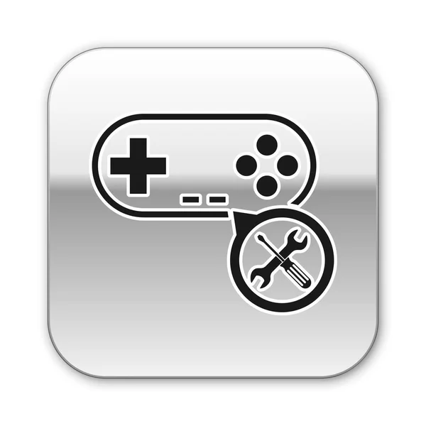 Černý gamepad se šroubovákem a klíčem je izolován na bílém pozadí. Seřízení, servis, nastavení, údržba, opravy, upevnění. Stříbrné čtvercové tlačítko. Vektorová ilustrace — Stockový vektor