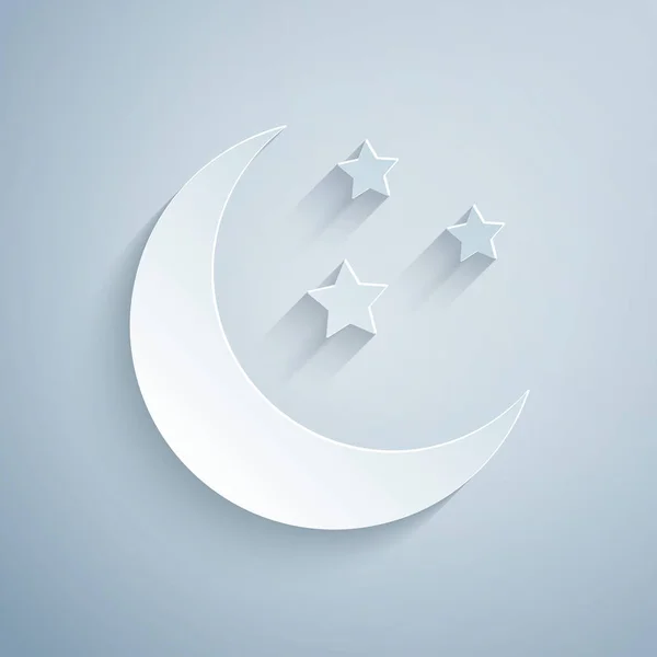 Vystřihovaná papírová ikona měsíc a hvězdy izolované na šedém pozadí. Styl papírového umění. Vektorová ilustrace — Stockový vektor