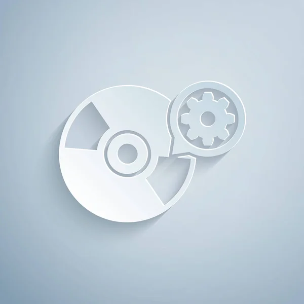 Papír na disk CD nebo DVD a ikona převodové jednotky izolované na šedém pozadí. Úprava aplikace, koncept služby, nastavení možností, údržba, opravy, upevnění. Styl papírového umění. Vektorová ilustrace — Stockový vektor