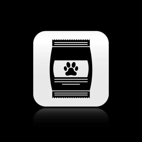 Black Bag of food for pet icon isolated on black background. Food for animals. Pet food package. Dog or cat paw print. Silver square button. Vector Illustration — Stock Vector