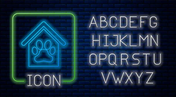 Gloeiende neon hondenhuis en Paw Print huisdier pictogram geïsoleerd op bakstenen muur achtergrond. Hond kennel. Neon licht alfabet. Vector illustratie — Stockvector