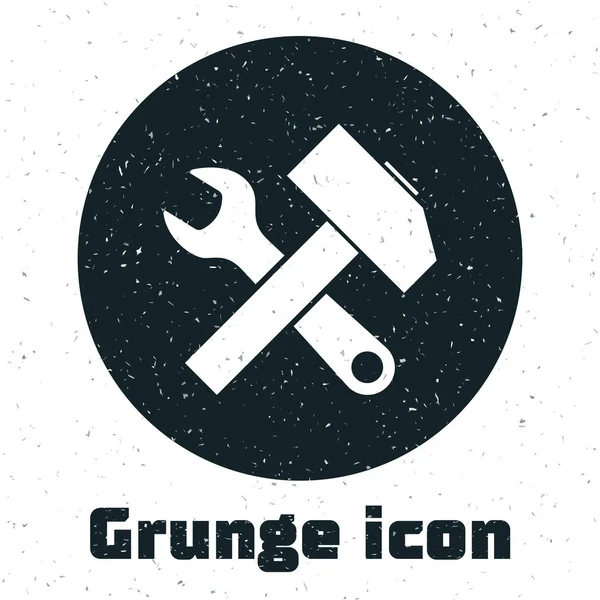 Grunge Icono de martillo y llave inglesa cruzada aislado sobre fondo blanco. Herramientas de hardware. Ilustración vectorial — Vector de stock