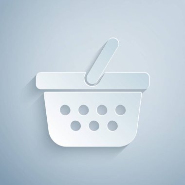 Kağıt kesiği sepet simgesi gri arkaplanda izole edilmiş. İnternetten satın alma konsepti. Servis tabelası. Alışveriş arabası sembolü. Kağıt sanatı tarzı. Vektör İllüstrasyonu
