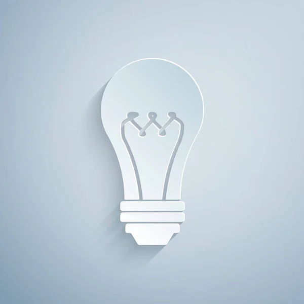 Corte de papel Icono de bombilla aislada sobre fondo gris. Símbolo de energía e idea. Lámpara eléctrica. Estilo de arte de papel. Ilustración vectorial — Archivo Imágenes Vectoriales