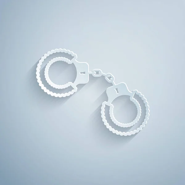 Paper cut Sexy fluffy handcuffs icon isolated on grey background. Handcuffs with fur. Fetish accessory. Sex shop stuff for sadist and masochist. Paper art style. Vector Illustration — Stock Vector