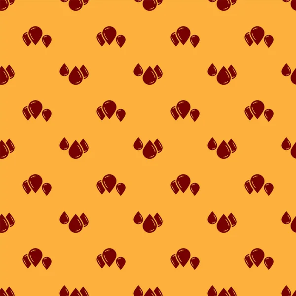 Rojo icono gota de agua aislado patrón sin costura sobre fondo marrón. Ilustración vectorial — Vector de stock