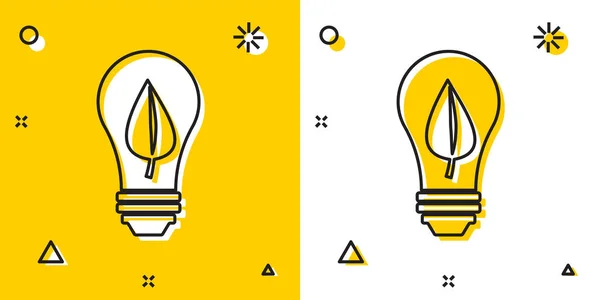 Black Light bulb with leaf icon isolated on yellow and white background. Eco energy concept. Alternative energy concept. Random dynamic shapes. Vector Illustration — Stock Vector