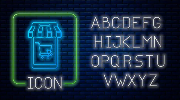 Leuchtendes Neon-Handy und Einkaufswagen mit gestreiftem Markisensymbol isoliert auf Backsteinwand-Hintergrund. Online-Kauf-Symbol. Supermarkt-Warenkorb Symbol. Neonlicht-Alphabet. Vektorillustration — Stockvektor