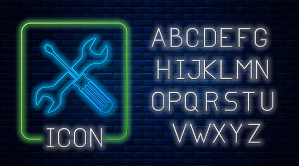 Néon brilhante Chave de fenda cruzada e chave de ferramentas ícone isolado no fundo da parede de tijolo. Símbolo da ferramenta de serviço. Alfabeto claro de néon. Ilustração vetorial — Vetor de Stock