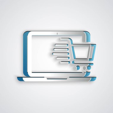 Gri arkaplanda izole edilmiş bilgisayar simgesindeki kağıt kesiği alışveriş arabası. Konsept e-ticaret, e-ticaret, online iş pazarlama. Kağıt sanatı tarzı. Vektör İllüstrasyonu