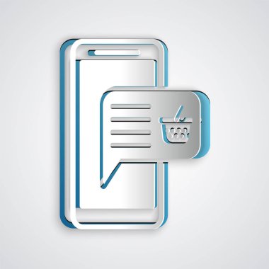 Kağıt gri arka planda izole Cep telefonu ve alışveriş sepeti simgesi kesti. Online satın alma sembolü. Süpermarket sepeti sembolü. Kağıt sanat tarzı. Vektör İllüstrasyonu