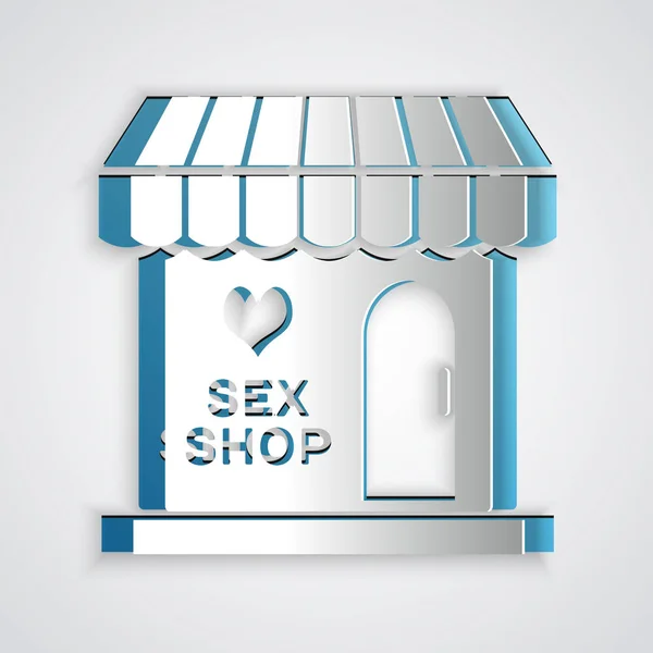 Paper cut Sex shop building with striped awning icon isolated on grey background. Sex shop, online sex store, adult erotic products concept. Paper art style. Vector Illustration — Stock Vector