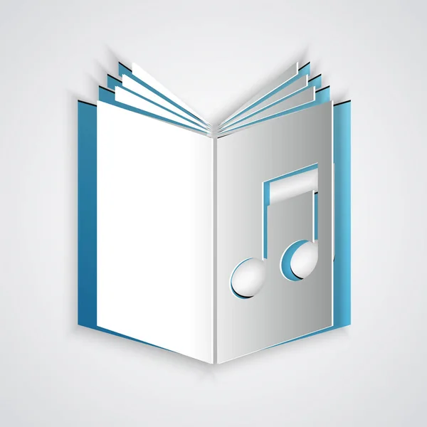 Pappersklipp ljud boks ikonen isolerad på grå bakgrund. Musikalisk anteckning med bok. Ljudguide tecken. Online läro koncept. Papperskonst stil. Vektor illustration — Stock vektor