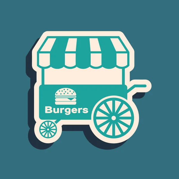 Green Fast street food cart z ikoną markizy izolowane na niebieskim tle. Burger lub ikona hamburgera. Miejski kiosk. Długi styl cienia. Ilustracja wektora — Wektor stockowy