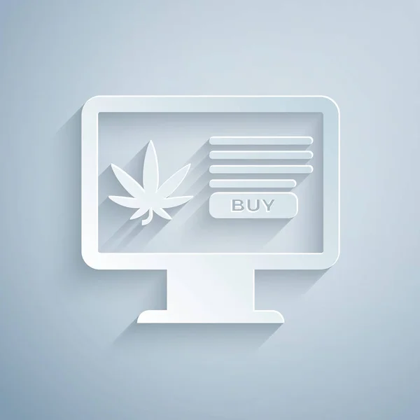 Corte de papel Monitor de computadora y marihuana medicinal o icono de hoja de cannabis aislado sobre fondo gris. Símbolo de compra online. Cesta del supermercado. Estilo de arte de papel. Ilustración vectorial — Vector de stock