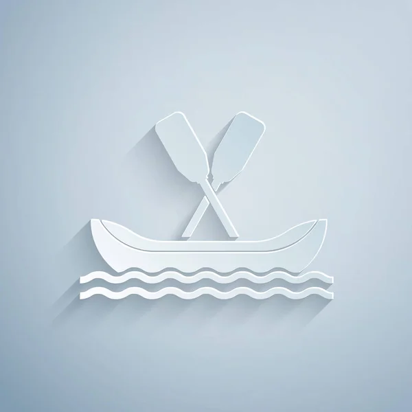 Paper cut Rafting boat icon isolated on grey background. Kayak with paddles. Water sports, extreme sports, holiday, vacation, team building. Paper art style. Vector Illustration — Stock Vector