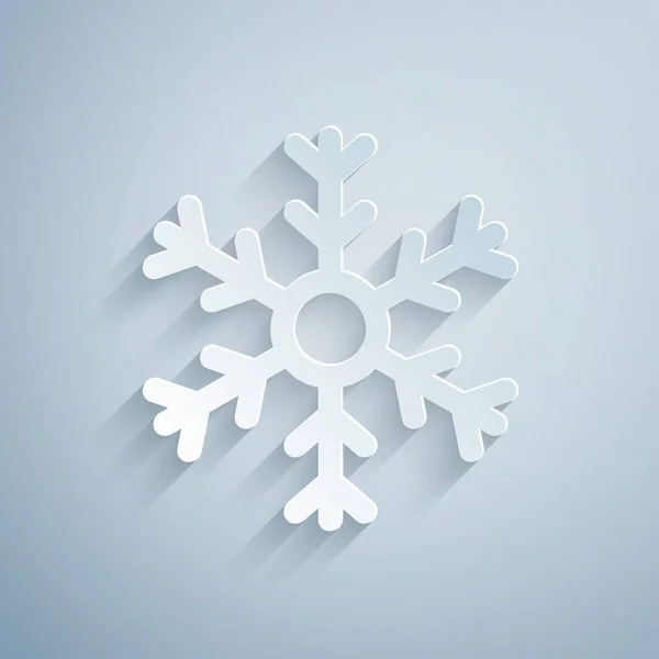 Papírvágás Hópehely ikon elszigetelt szürke háttér. Papírművészeti stílus. Vektorillusztráció — Stock Vector
