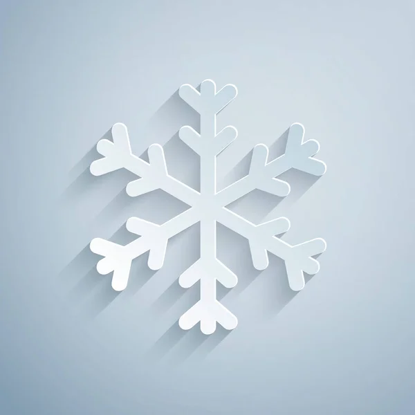 Corte de papel Icono de copo de nieve aislado sobre fondo gris. Estilo de arte de papel. Ilustración vectorial — Vector de stock
