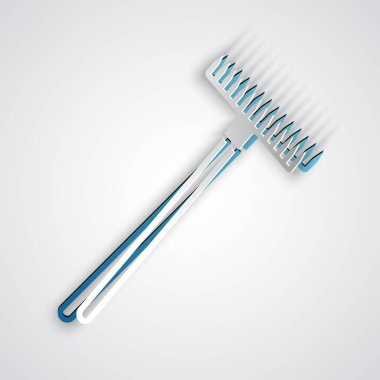 Kağıt kesiği bahçe tırmığı simgesi gri arkaplanda izole edilmiş. Bahçecilik, tarım, çiftçilik aleti. Toprak işçisi. Temizlik ekipmanları. Kağıt sanatı tarzı. Vektör İllüstrasyonu