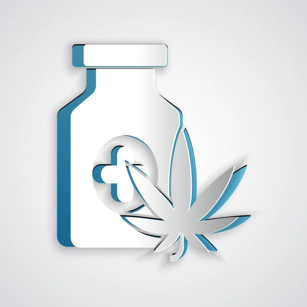 Paper cut Medical bottle with marijuana or cannabis leaf icon isolated on grey background. Mock up of cannabis oil extracts in jars. Paper art style. Vector Illustration — Stock Vector