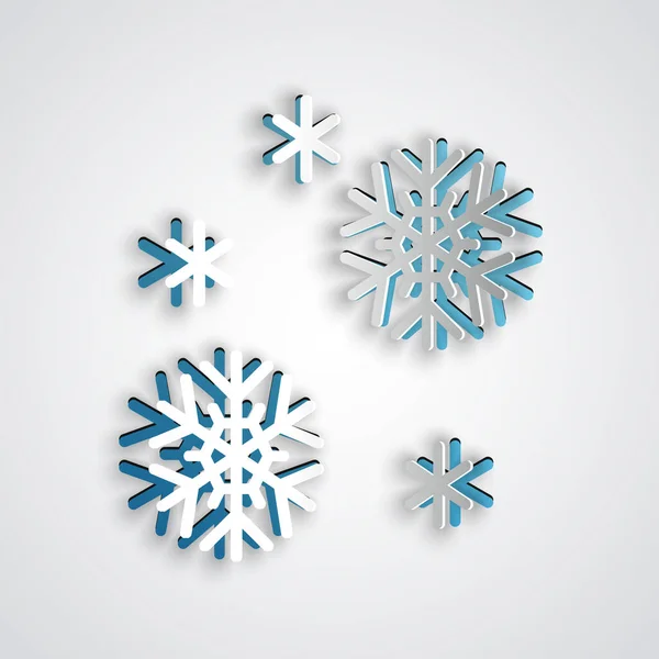 Corte de papel Icono de nieve aislado sobre fondo gris. Estilo de arte de papel. Ilustración vectorial — Vector de stock