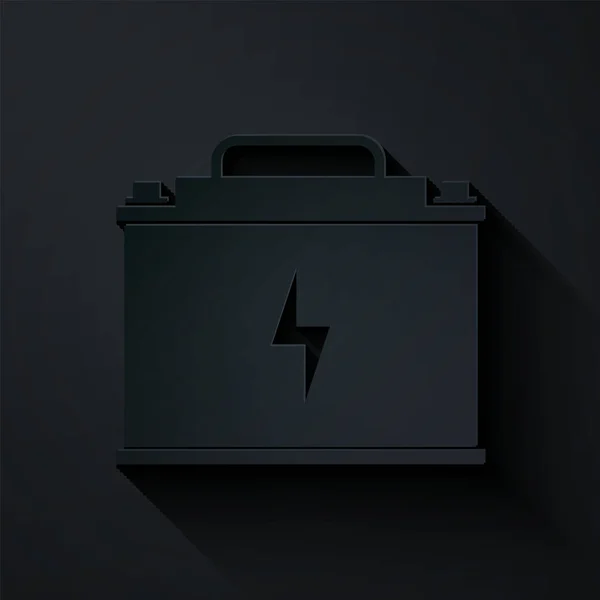Paper cut Car battery icon isolated on black background. Accumulator battery energy power and electricity accumulator battery. Lightning bolt. Paper art style. Vector Illustration — Stock Vector