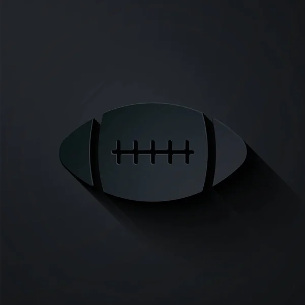 Pappersklipp amerikansk fotboll ikon isolerad på svart bakgrund. Papperskonst. Vektor Illustration — Stock vektor