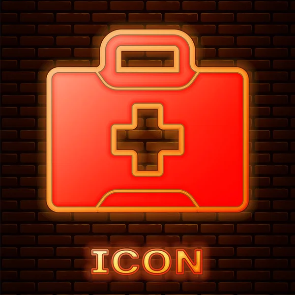 Glowing Neon First Aid Kit Icon Isolated Brick Wall Background — Stock Vector