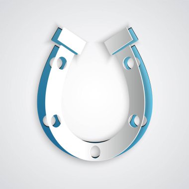 Kağıt kesiği at nalı simgesi gri arkaplanda izole edilmiş. Kağıt sanatı tarzı. Vektör.