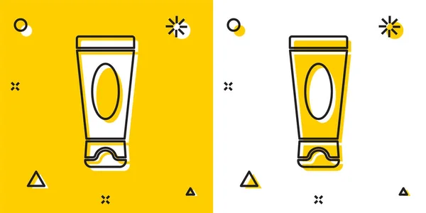 Icono Tubo Cosmético Crema Loción Negra Aislado Sobre Fondo Amarillo — Vector de stock