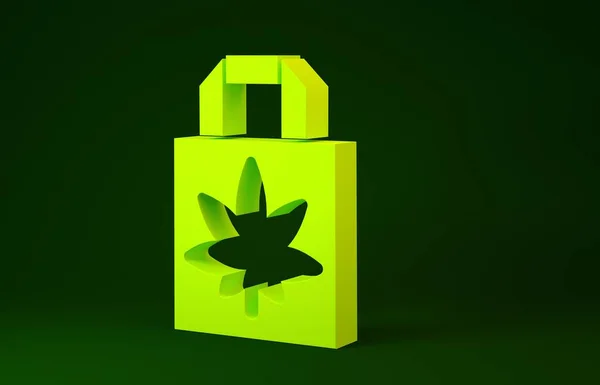 Amarillo Bolsa de papel de compras de marihuana medicinal o icono de hoja de cannabis aislado sobre fondo verde. Comprar cannabis. Un símbolo de cáñamo. Concepto minimalista. 3D ilustración 3D render —  Fotos de Stock