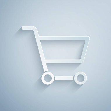 Kağıt kesiği, gri arka planda izole edilmiş alışveriş arabası simgesi. İnternetten satın alma konsepti. Servis tabelası. Süpermarket sepeti sembolü. Kağıt sanatı tarzı. Vektör İllüstrasyonu.