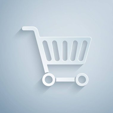 Kağıt kesiği, gri arka planda izole edilmiş alışveriş arabası simgesi. İnternetten satın alma konsepti. Servis tabelası. Süpermarket sepeti sembolü. Kağıt sanatı tarzı. Vektör İllüstrasyonu.