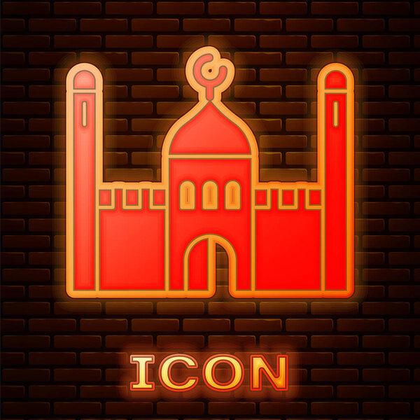 Glowing neon Muslim Mosque icon isolated on brick wall background. Vector Illustration
