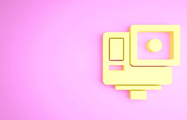 Желтое действие экстремальная камера значок изолирован на розовом фоне. Видеокамеры для съёмок экстремальных видов спорта. Концепция минимализма. 3D-рендеринг — стоковое фото