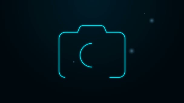 Leuchtende Leuchtschrift Fotokamera-Symbol isoliert auf schwarzem Hintergrund. Ikone der Fotokamera. 4K Video Motion Grafik Animation — Stockvideo