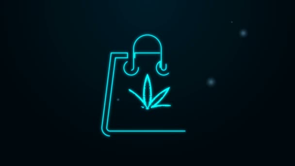 Línea de neón brillante Bolsa de papel de compras de marihuana medicinal o icono de hoja de cannabis aislado sobre fondo negro. Comprar cannabis. Un símbolo de cáñamo. Animación gráfica de vídeo 4K — Vídeo de stock