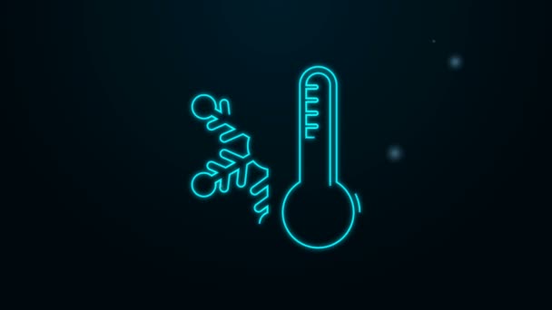 Leuchtendes Neon Line Thermometer mit Schneeflockensymbol isoliert auf schwarzem Hintergrund. 4K Video Motion Grafik Animation — Stockvideo